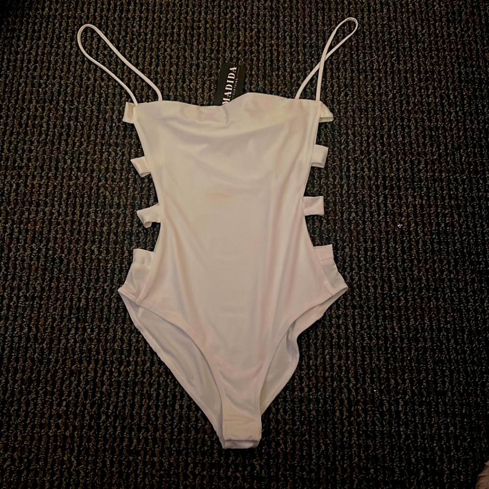 White body suit with side slits